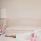 Joan Collins Relaxes by Slim Aarons - White Maple Floater