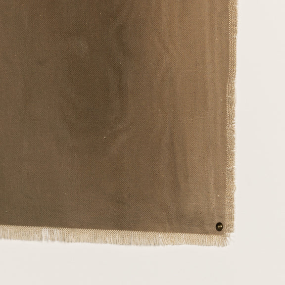 Abstract oil painting with subtle earth tones, featuring a gradient from deep brown to lighter shades. Textured canvas visible, showcasing the artist's technique. Corner of the artwork visible, demonstrating the painting's edge and framing.