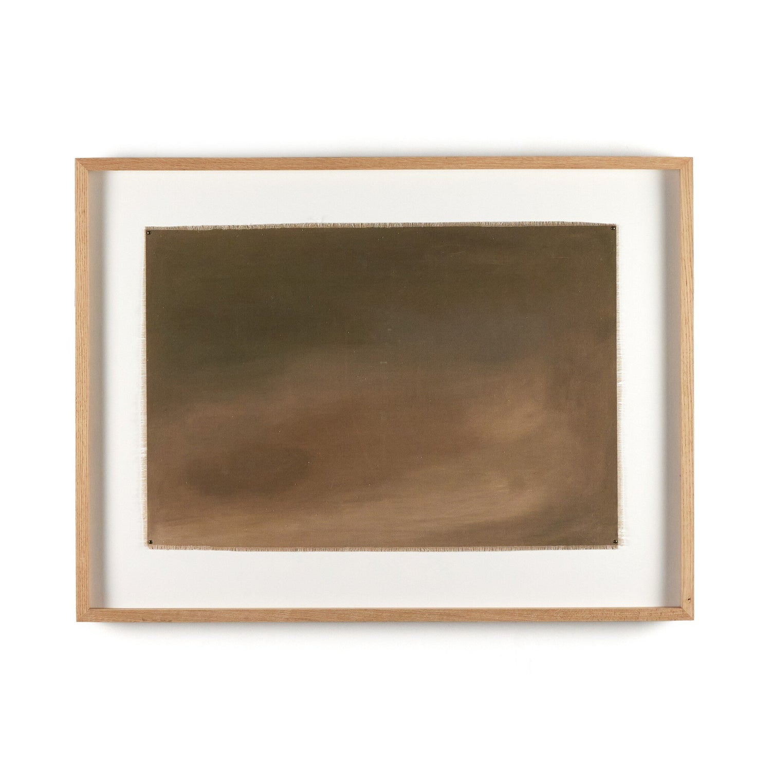 Abstract oil painting in earthy tones, framed in light wood. Subtle gradient from dark olive to warm brown, suggesting movement and depth. Minimalist artwork showcasing Melody Joy McMunn's earth-inspired style and mixed media techniques.