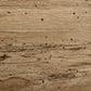 Close-up of rustic oak wood texture with wormwood effect, showing natural grain patterns and small dark spots simulating insect damage, representing the finish of the Abaso Accent Bench