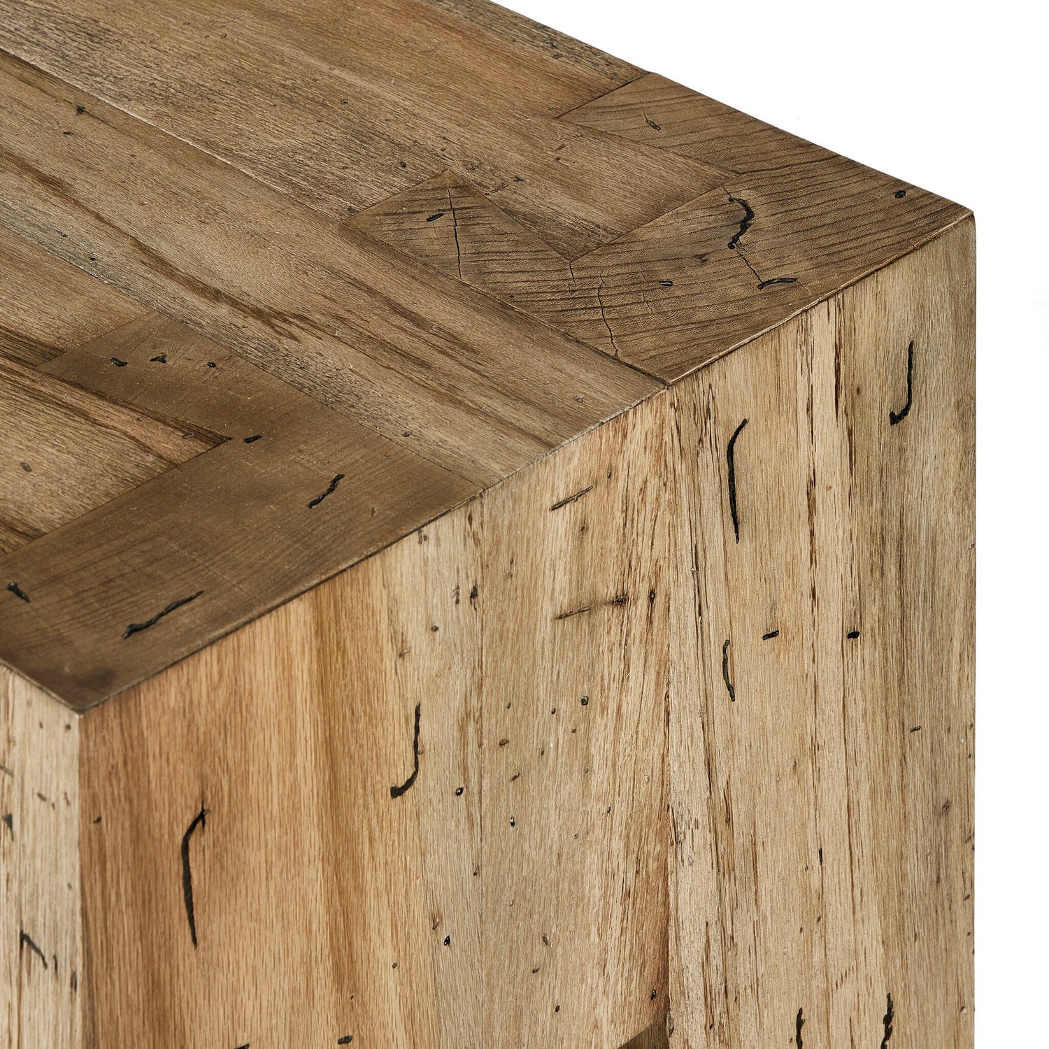 Rustic oak accent bench with thick-cut veneer, showcasing wormwood-like finish and clean Parsons lines. Close-up view of chunky squared leg and dovetail joinery, highlighting the bench's craftsmanship and natural wood grain texture.