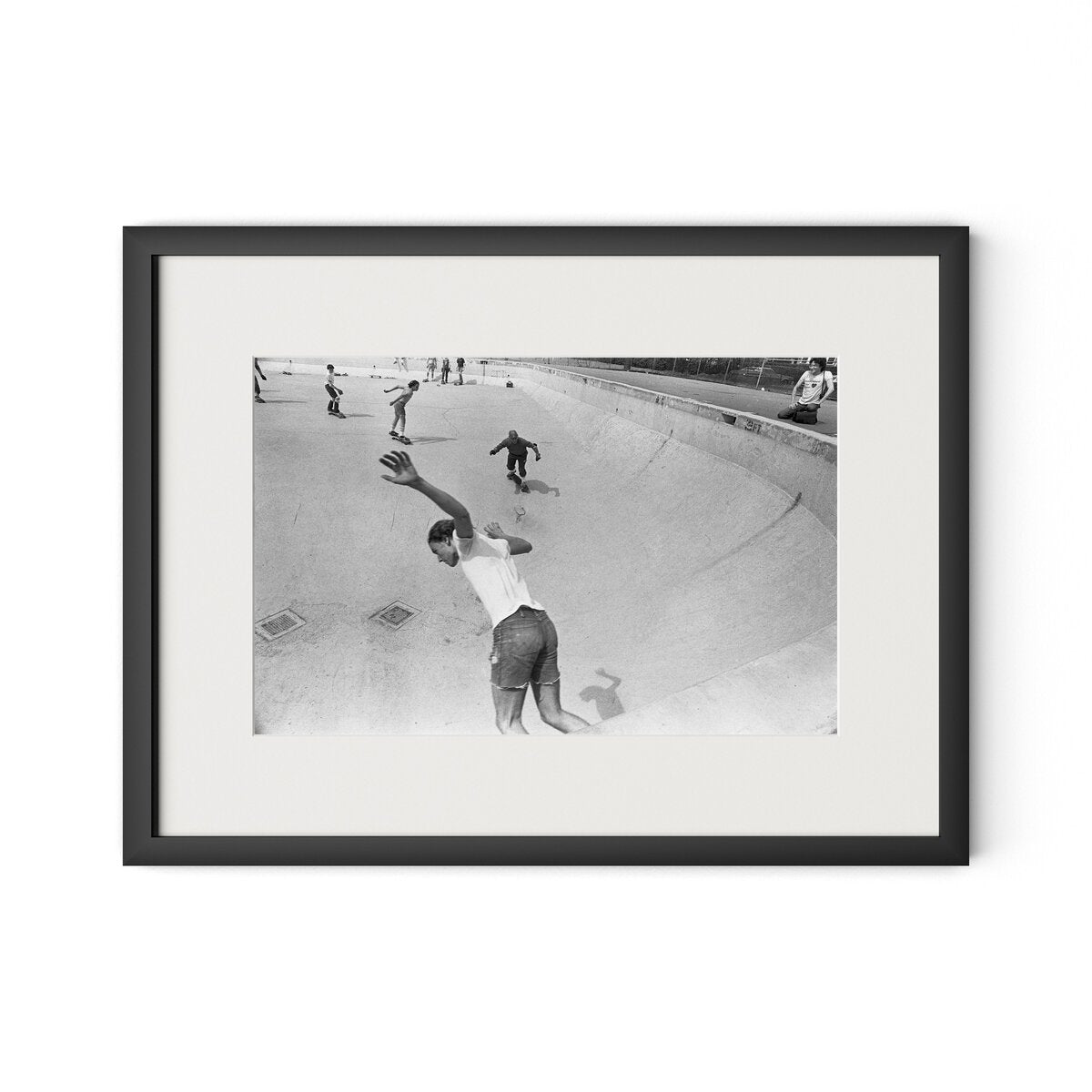 Skateboarding In A Drained Pool I by Barbara Alper - Black Maple